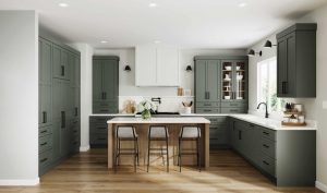 Contemporary Style Bath Design image by Guthrie Kitchen & Bath Plus Tall white chimney-style range hood centered over a cooktop between green wall cabinets in a remodeled kitchen