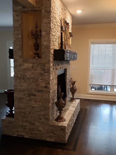 Completed brick fireplace surround by Guthrie Kitchen & Bath